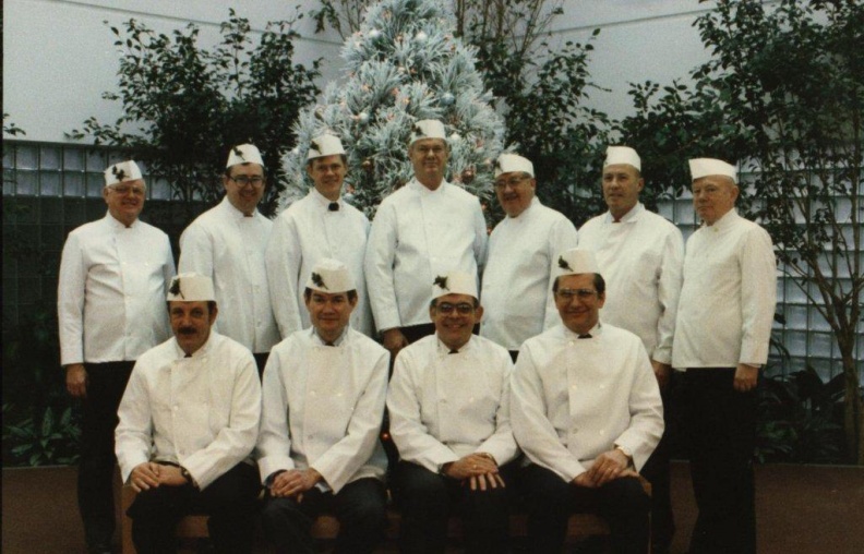 Woodward Senior managers and officers ready to serve Christmas dinner to members  in 1990_.jpg